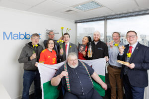 Welsh Team with St David's Day memorabilia | Mabbett Cardiff Office opening